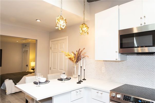 Interior, Kitchen, Pendant Lights, Recessed Lighting, Stainless Steel Appliances, Wood Texture Flooring