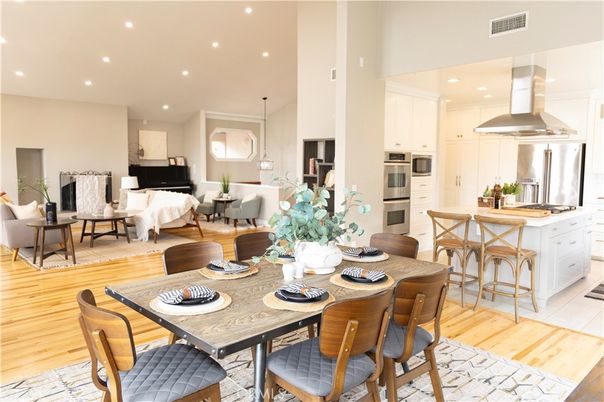 Dining room, Interior, Kitchen, Living room, Pendant Lights, Recessed Lighting, Stainless Steel Appliances, Wood Texture Flooring