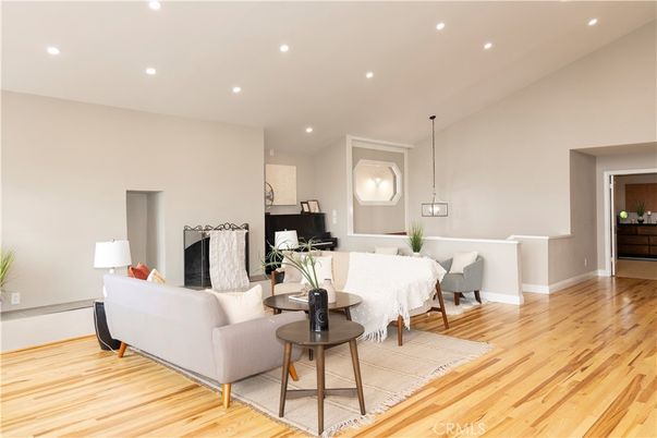 Dining room, Fireplace, Interior, Living room, Pendant Lights, Recessed Lighting, Wood Texture Flooring