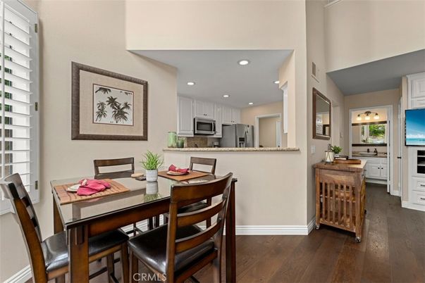 Dining room, Interior, Kitchen, Recessed Lighting, Stainless Steel Appliances, Wood Texture Flooring