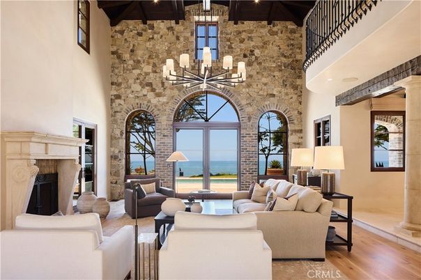Chandelier, Fireplace, Interior, Living room, Stone Walls, Water, Wooden Beams, Wood Texture Flooring