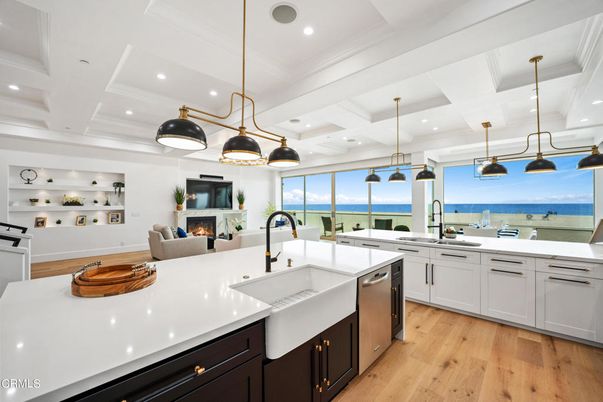 Fireplace, Interior, Kitchen, Living room, Pendant Lights, Recessed Lighting, Water, Wood Texture Flooring