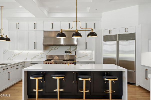 Interior, Kitchen, Marble Walls, Pendant Lights, Recessed Lighting, Stainless Steel Appliances, Wood Texture Flooring