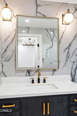 Bathroom, Dual Sink Vanities, Interior, Marble Walls, Recessed Lighting