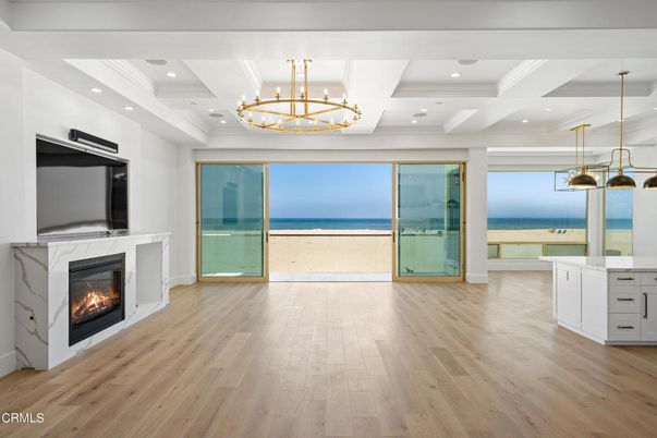 Chandelier, Fireplace, Interior, Pendant Lights, Recessed Lighting, Water, Wood Texture Flooring