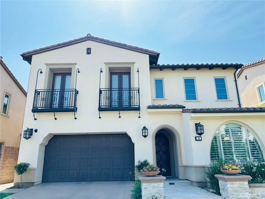 Attached, Exterior, Facade, Spanish Mediterranean