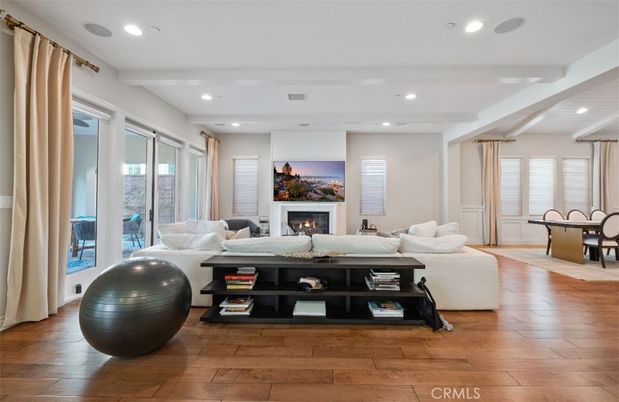 Dining room, Fireplace, Interior, Living room, Recessed Lighting, Wood Texture Flooring