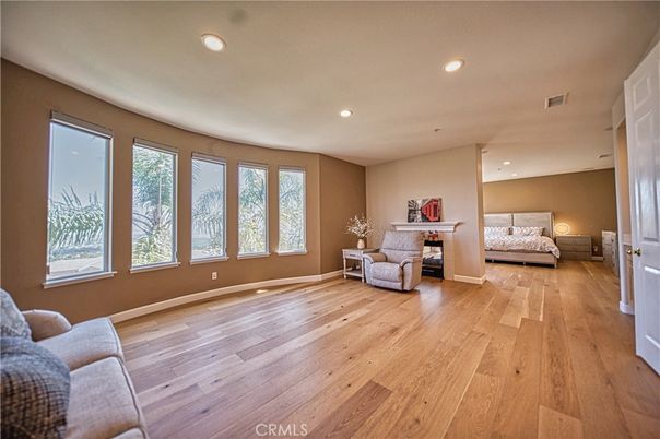 Bedroom, Fireplace, Interior, Recessed Lighting, Wood Texture Flooring
