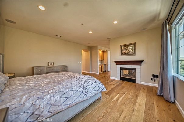 Bedroom, Fireplace, Interior, Recessed Lighting, Wood Texture Flooring