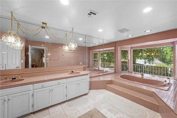Bathroom, Chandelier, Dual Sink Vanities, Glass Shower, Interior, Recessed Lighting, Tile Countertops