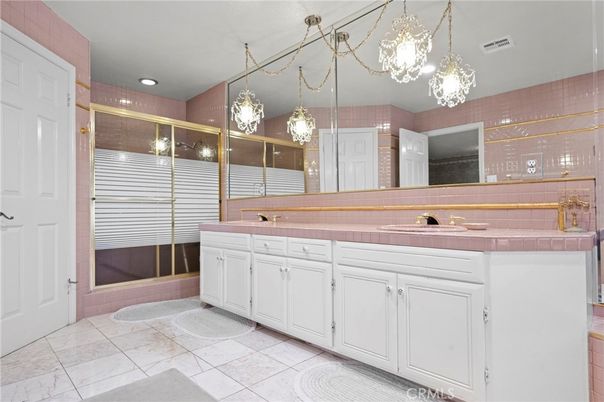 Bathroom, Dual Sink Vanities, Glass Shower, Interior, Pendant Lights, Recessed Lighting, Tile Countertops