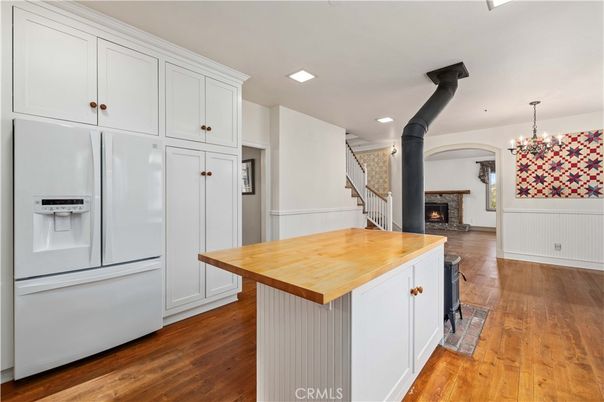 Chandelier, Fireplace, Interior, Kitchen, Pendant Lights, Recessed Lighting, Wood Texture Flooring