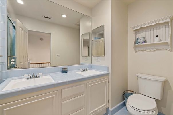 Bathroom, Dual Sink Vanities, Interior, Recessed Lighting, Tile Countertops