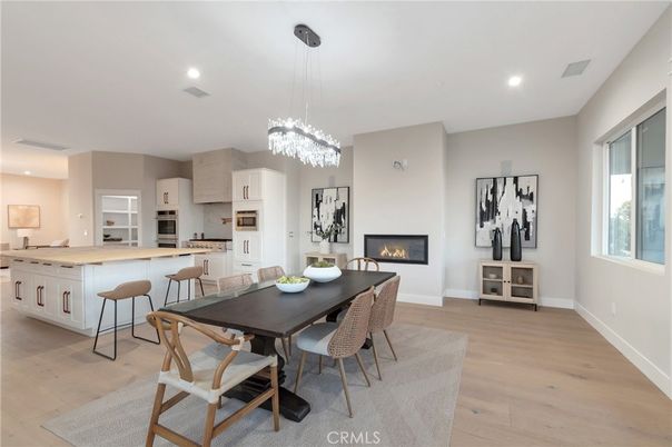 Chandelier, Dining room, Fireplace, Interior, Kitchen, Pendant Lights, Recessed Lighting, Wood Texture Flooring