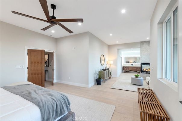 Bedroom, Fireplace, Interior, Recessed Lighting, Wood Texture Flooring