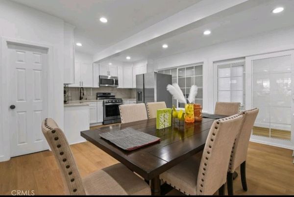 Dining room, Interior, Kitchen, Recessed Lighting, Stainless Steel Appliances, Wood Texture Flooring
