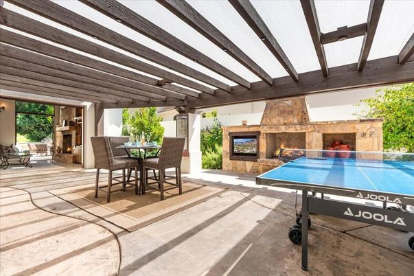 Exterior, Fireplace, Pool