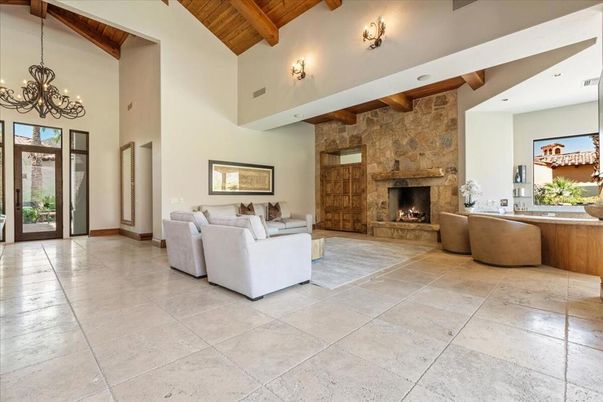 Chandelier, Fireplace, Interior, Living room, Recessed Lighting, Stone Walls, Wooden Beams, Wooden Ceilings