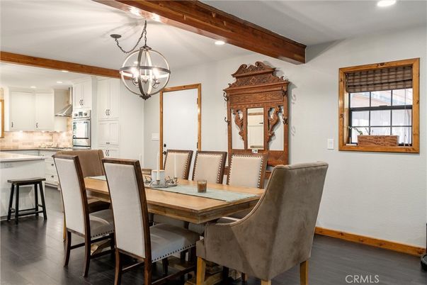 Chandelier, Dining room, Interior, Kitchen, Pendant Lights, Recessed Lighting, Wooden Beams, Wood Texture Flooring