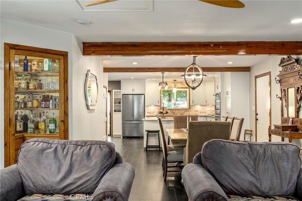 Dining room, Interior, Kitchen, Living room, Pendant Lights, Recessed Lighting, Stainless Steel Appliances, Wooden Beams, Wood Texture Flooring