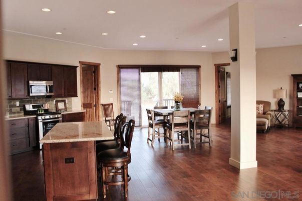 Dining room, Interior, Kitchen, Recessed Lighting, Stainless Steel Appliances, Wood Texture Flooring