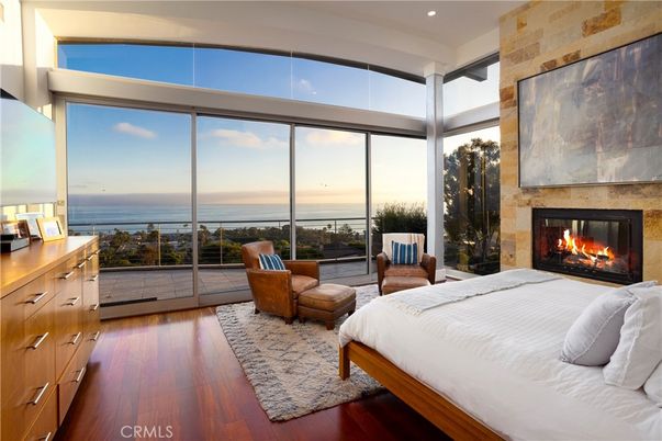 Bedroom, Fireplace, Interior, Recessed Lighting, Water, Wood Texture Flooring