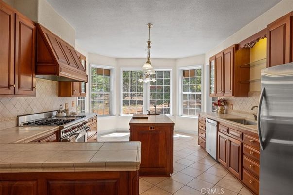 Interior, Kitchen, Pendant Lights, Stainless Steel Appliances, Tile Countertops