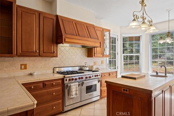 Chandelier, Interior, Kitchen, Pendant Lights, Stainless Steel Appliances, Tile Countertops