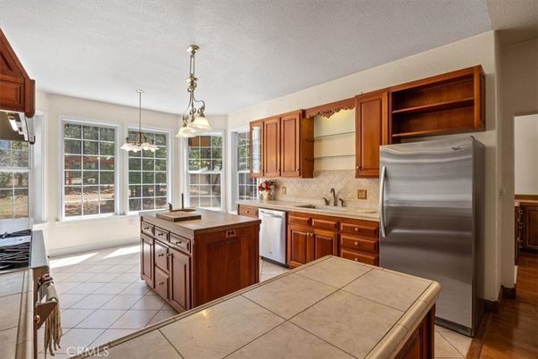 Interior, Kitchen, Pendant Lights, Stainless Steel Appliances, Tile Countertops