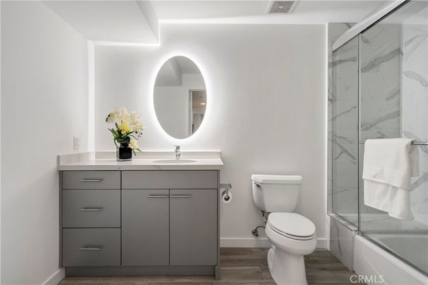 Bathroom, Glass Shower, Interior, Marble Walls, Wood Texture Flooring