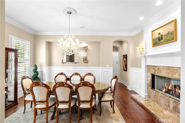 Chandelier, Dining room, Fireplace, Interior, Recessed Lighting, Wood Texture Flooring