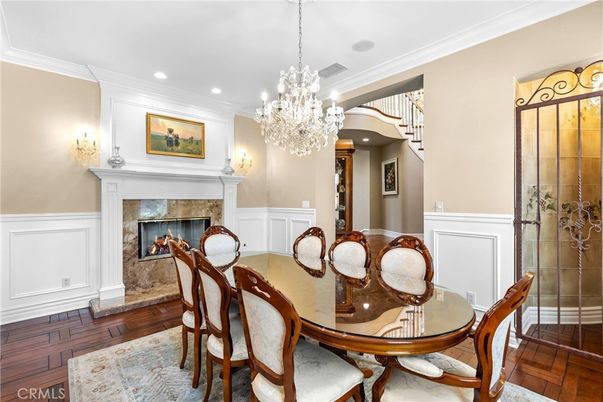 Chandelier, Dining room, Fireplace, Interior, Recessed Lighting, Wood Texture Flooring