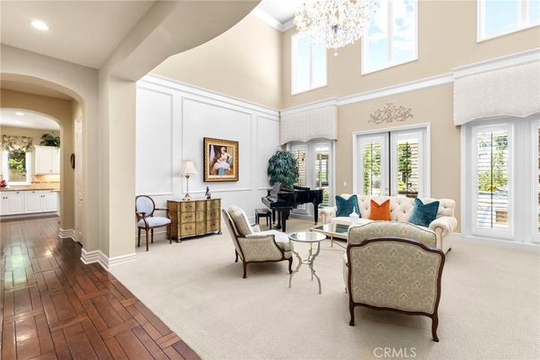 Chandelier, Interior, Living room, Piano, Recessed Lighting, Wood Texture Flooring