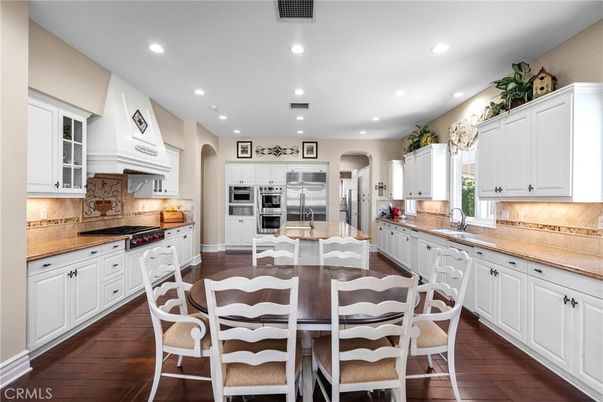Dining room, Interior, Kitchen, Recessed Lighting, Stainless Steel Appliances, Wood Texture Flooring