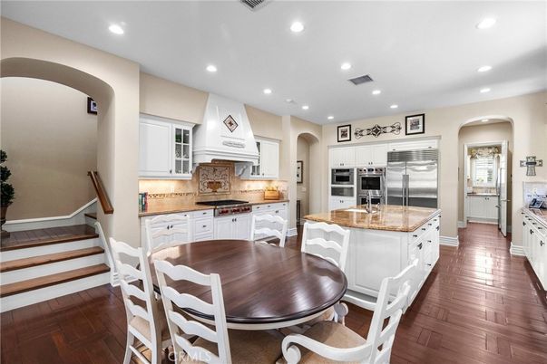 Dining room, Interior, Kitchen, Recessed Lighting, Stainless Steel Appliances, Wood Texture Flooring