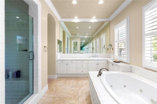 Bathroom, Dual Sink Vanities, Glass Shower, Interior, Recessed Lighting, Tile Countertops