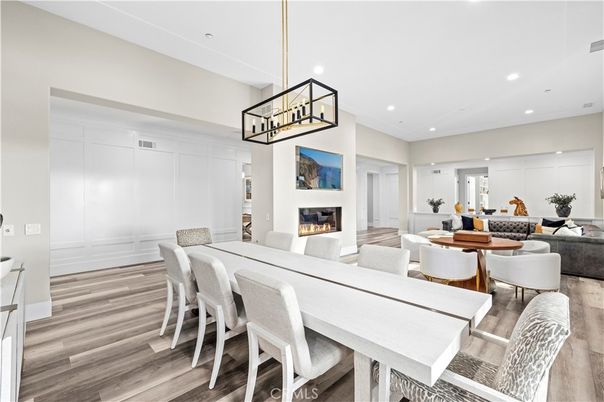 Dining room, Fireplace, Interior, Living room, Pendant Lights, Recessed Lighting, Wood Texture Flooring