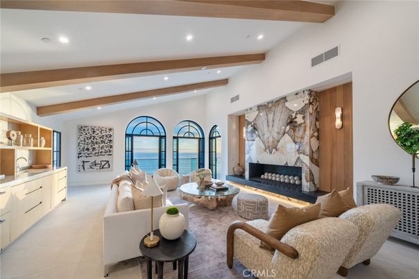Fireplace, Interior, Living room, Recessed Lighting, Water, Wooden Beams
