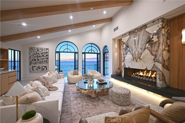 Fireplace, Interior, Living room, Recessed Lighting, Water, Wooden Beams