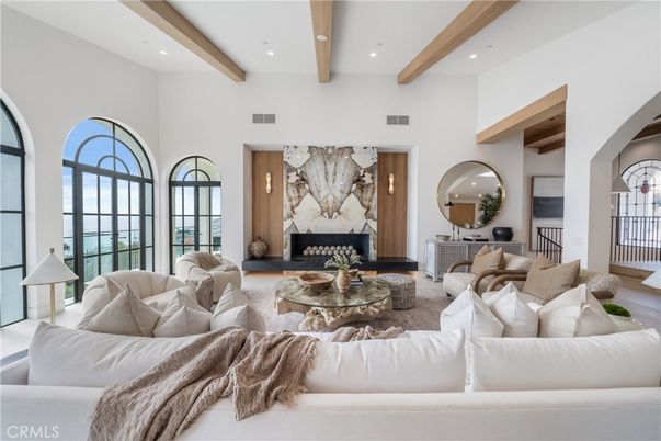 Fireplace, Interior, Living room, Recessed Lighting, Water, Wooden Beams