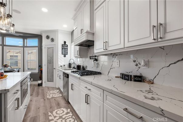 Interior, Kitchen, Marble Walls, Pendant Lights, Recessed Lighting, Wood Texture Flooring