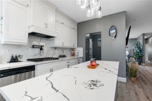 Interior, Kitchen, Marble Walls, Stainless Steel Appliances, Wood Texture Flooring