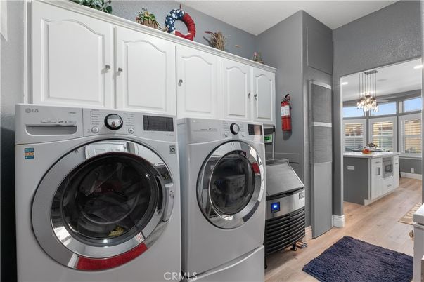 Interior, Pendant Lights, Utility Closets, Washer, Wood Texture Flooring