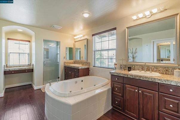 Bathroom, Dual Sink Vanities, Interior, Recessed Lighting, Wood Texture Flooring