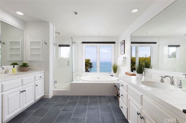 Bathroom, Dual Sink Vanities, Glass Shower, Interior, Recessed Lighting, Tile Countertops, Water