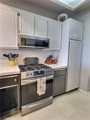 Interior, Kitchen, Stainless Steel Appliances, Tile Countertops