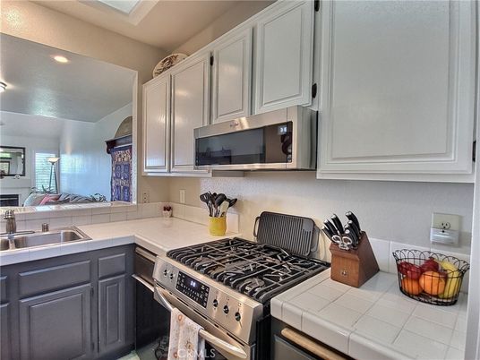Interior, Kitchen, Recessed Lighting, Tile Countertops