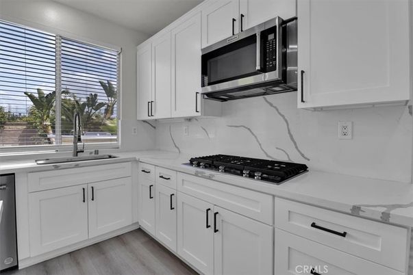 Interior, Kitchen, Marble Walls, Stainless Steel Appliances, Wood Texture Flooring