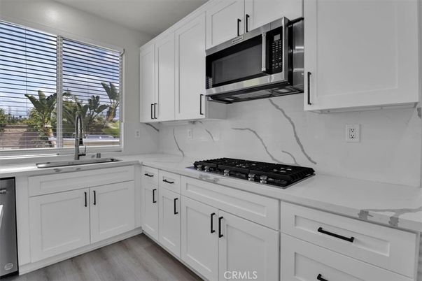 Interior, Kitchen, Marble Walls, Stainless Steel Appliances, Wood Texture Flooring