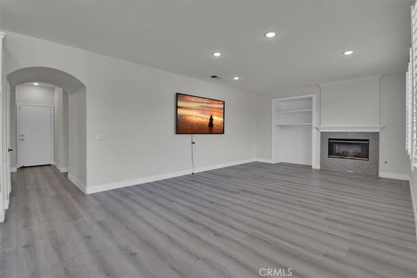 Empty room, Fireplace, Interior, Recessed Lighting, Wood Texture Flooring